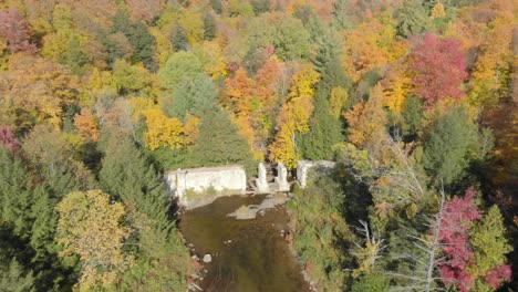 Carbide-Willson-Ruins,-Gatineau-Park,-Lac-Meech-Lake,-Chelsea,-Quebec,-Trans-Canada-Trail,-aerial-drone-view-on-a-sunny-Fall-day