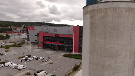 Fjällräven-indoor-sporting-arena-in-Örnsköldsvik,-aerial-orbit-view