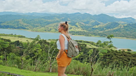 Shot-of-blonde-girl-watching-at-the-Arenal-national-park-in-Costa-Rica