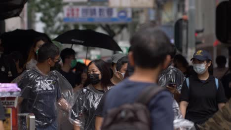 Telephoto-Shot-of-Hong-Kong-protesters-walking-towards-camera