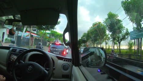 Time-Lapse-Of-Tourist-Car-Driving-Around-Bali,-Indonesia