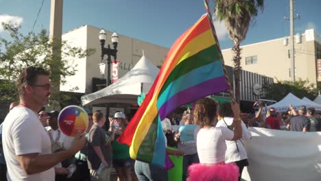 People-Marching-in-Street-at-River-City-Pride-Parade-in-Jacksonville,-FL