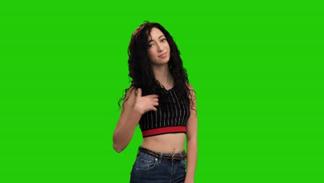 Caucasian-girl-with-long-curly-hair-wearing-crop-top-turns-around