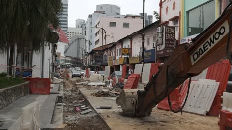 Wide-Angle-View-of-City-undergoing-construction-work-in-the-middle-of-road-during-overcast-day
