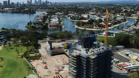 Gold-Coast-construction-site,-in-distance-Surfers-Paradise-skyline,-summers-day