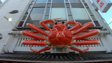 Exterior-of-Japanese-crab-restaurant-Kani-Doraku-with-giant-moving-crab-billboard
