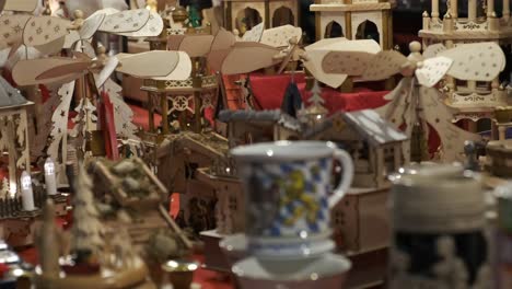 Close-up-of-various-beautiful-handmade-decoration-items-sold-in-a-booth-on-famous-Nuremberg-Christkindlesmarkt