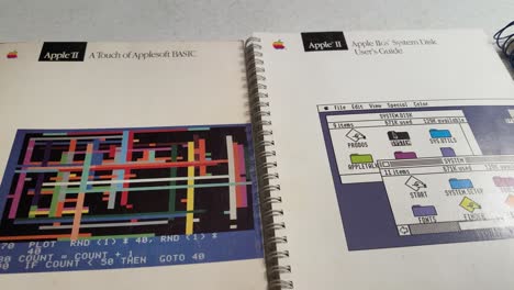 Close-up-shot-of-Apple-IIGS-System-Disk-User's-Guide,-vintage-Apple-IIGS-reference-books-from-home-computer-computing-era