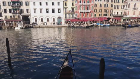 Gondola-And-Motor-Boat-On-The-Grand-Canal-in-Venice,-Italy