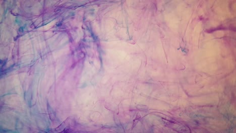 Fluid-blood-like-streaks-of-acrylic-ink-moving-slowly-in-water,-weird-but-beautiful-background-footage-in-pastel-colors