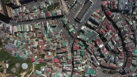 Top-down-drone-shot-of-key-buildings,-lake-and-sites-in-the-city-center-of-Da-Lat-or-Dalat-in-the-Central-Highlands-of-Vietnam-on-sunny-day