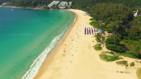 Aerial-flying-drone-view-of-Kot-Noi-Beach-white-sandy-beach-on-sunny-tropical-paradise-island-with-aqua-blue-sky-sea-water-ocean