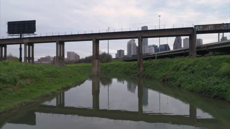 This-video-is-about-an-aerial-view-of-the-Buffalo-Bayou-near-downtown-Houston-on-a-cloudy-day