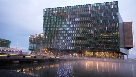 The-Harpa-Concert-Hall-and-Conference-Centre-in-Reykjavik-Iceland-has-a-stunning-display-of-dancing-and-moving-lights-on-the-unique-architecture-in-downtown-Reykjavik