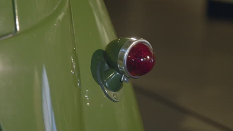 A-brass-tail-light,-lamp-of-an-old,-retro-car