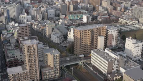 Tokyo,-Aerial-rise-in-early-morning-in-Urban-environment-of-Japan