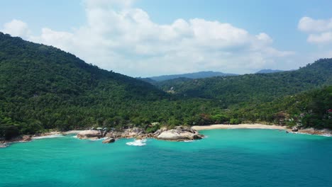 Small-secluded-sandy-beaches-surrounded-by-tropical-jungle