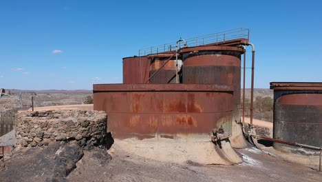 Rusty-water-tanks-from-old-mine