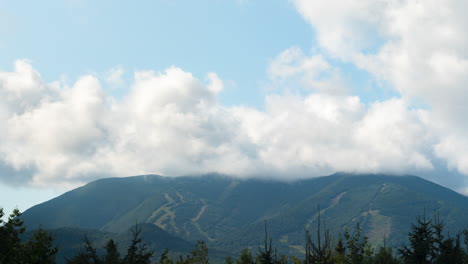 Amazing-cloud-cover-over-white-mountains-ski-hill-in-the-summer