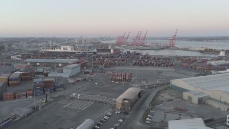 Aerial-view-across-Peel-Port-harbour-distribution-cargo-freight-shipyard-descend-in-lower