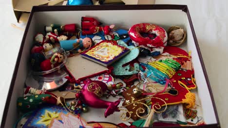 A-box-full-of-a-variety-of-colorful-Christmas-Tree-ornaments