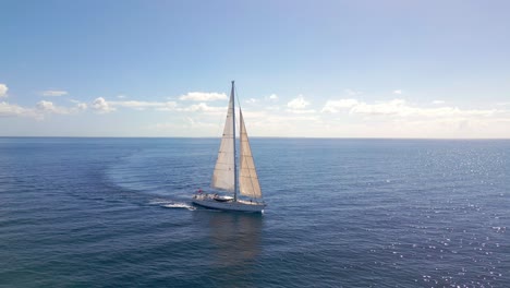 Drone-tracking-shot-of-Oyster-luxury-sailing-yacht-cruising-in-open-ocean