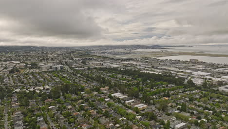 Burlingame-California-Aerial-v5-flyover-easton-addition-residential-neighborhood,-overlooking-at-ray-park,-millbrae,-ingold-milldale-and-sfo-airport-bay-views---Shot-with-Mavic-3-Cine---June-2022