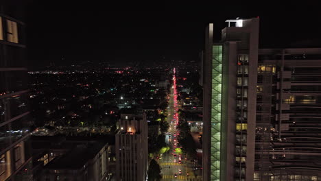 San-Jose-California-Aerial-v8-fly-straight-above-santa-clara-street-in-between-high-rise-buildings-capturing-shimmering-glass-window-and-horace-mann-neighborhood---Shot-with-Mavic-3-Cine---June-2022