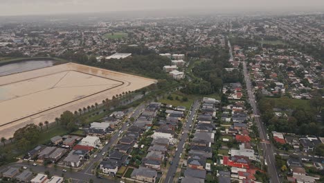 drone-of-houses-and-floods-in-Sydney,-Australia