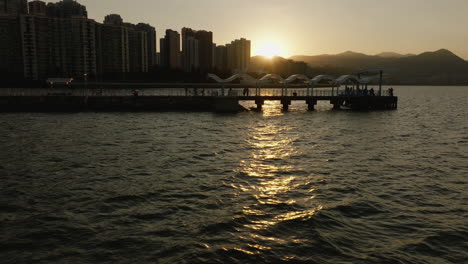 Hong-Kong-waters-at-sunset-time,-China
