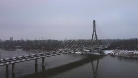 A-drone-video-of-a-suspension-bridge-in-poland,-above-the-Vistula-river
