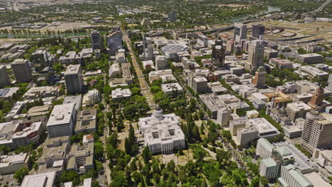 Sacramento-City-California-Aerial-v10-birds-eye-view-drone-flyover-state-capitol-park-featuring-neoclassical-building-structure-and-downtown-cityscape-at-daytime---Shot-with-Mavic-3-Cine---June-2022