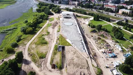 Construction-process-in-Nemunas-island-in-Kaunas,-aerial-drone-view