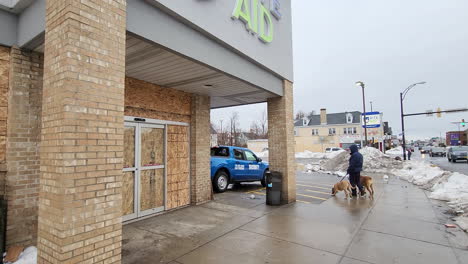 Establishing-shot-of-Shutdown-stores-due-to-the-looting-during-the-Snowstorm-blizzard