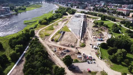 Landmark-building-in-Nemunas-island,-Kaunas-city,-construction-process,-aerial-view