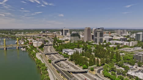 Sacramento-City-California-Aerial-v21-panoramic-panning-view-flyover-river-capturing-riverside-interstate-highway-traffic-and-downtown-cityscape-in-bright-daylight---Shot-with-Mavic-3-Cine---June-2022