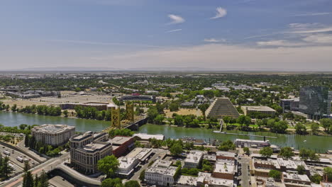 Sacramento-City-California-Aerial-v15-flyover-old-town-capturing-river-crossing-tower-bridge,-interstate-west-side-freeway-traffics-and-downtown-cityscape---Shot-with-Mavic-3-Cine---June-2022