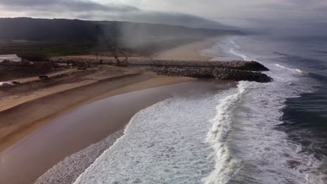 
Aerial-drone-flies-over-beautiful-beaches-of-Nazare-Portugal