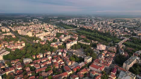 Incredible-aerial-view-of-Plovdiv-old-town,-drone-flying-above-Maritsa-River,-Bulgaria