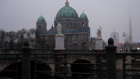 Beauty-of-Berlin-Cathedral-on-foggy-evening,-static-distance-view
