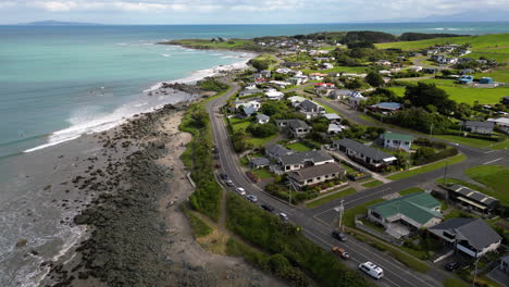 Aerial,-luxurious-ocean-side-houses-on-a-cliff-in-Riverton,-New-Zealand