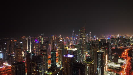 Aerial-panoramic-footage-of-futuristic-metropolis-at-night