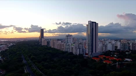 Skyscrapers-along-Anacaona-avenue-at-sunset,-Santo-Domingo-in-Dominican-Republic