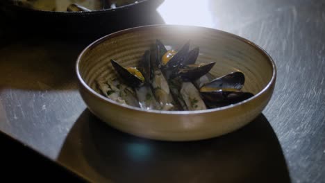 Mussels-are-added-on-a-plate