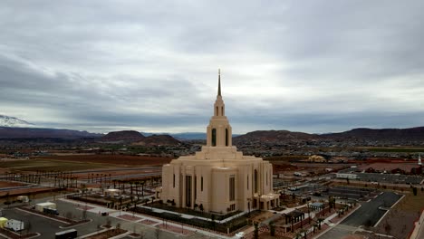Orbiting-aerial-parallax-view-of-the-Red-Cliffs-LDS-Temple-in-St