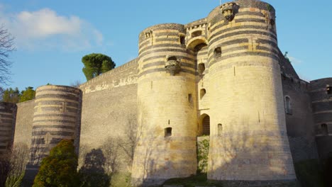 Towers-Of-Castle-Of-Angers-In-France-On-A-Sunny-Day---low-angle