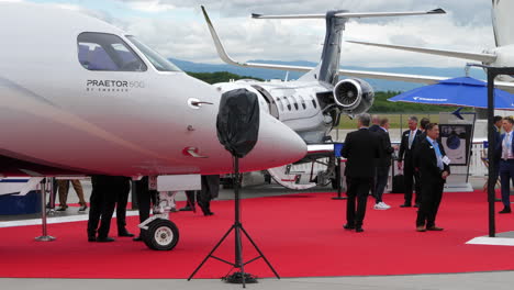 Embraer-Exhibit-with-Private-Jets-at-Aviation-Fair,-EBACE,-Geneva