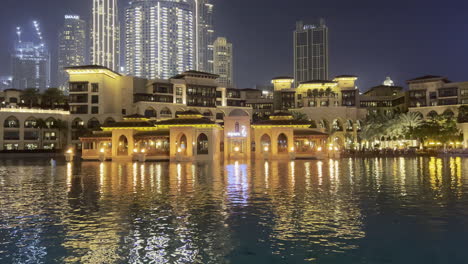 Thiptara-restaurant-at-night-seen-in-the-reflection-of-Dubai-fountain