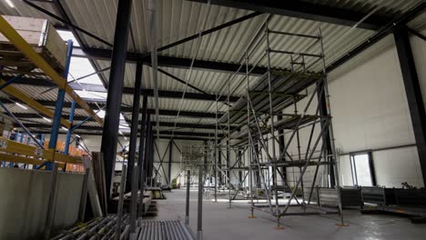 The-inside-of-a-construction-building,-scaffolding