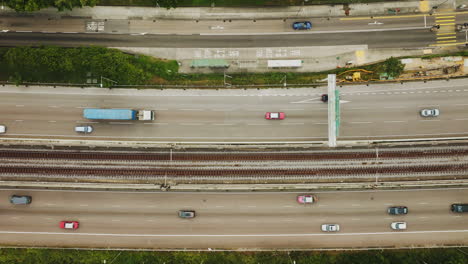 aerial-top-down-of-hong-kong-bridge-in-main-highway,-smart-city-in-asia,-aerial-view-of-traffic
